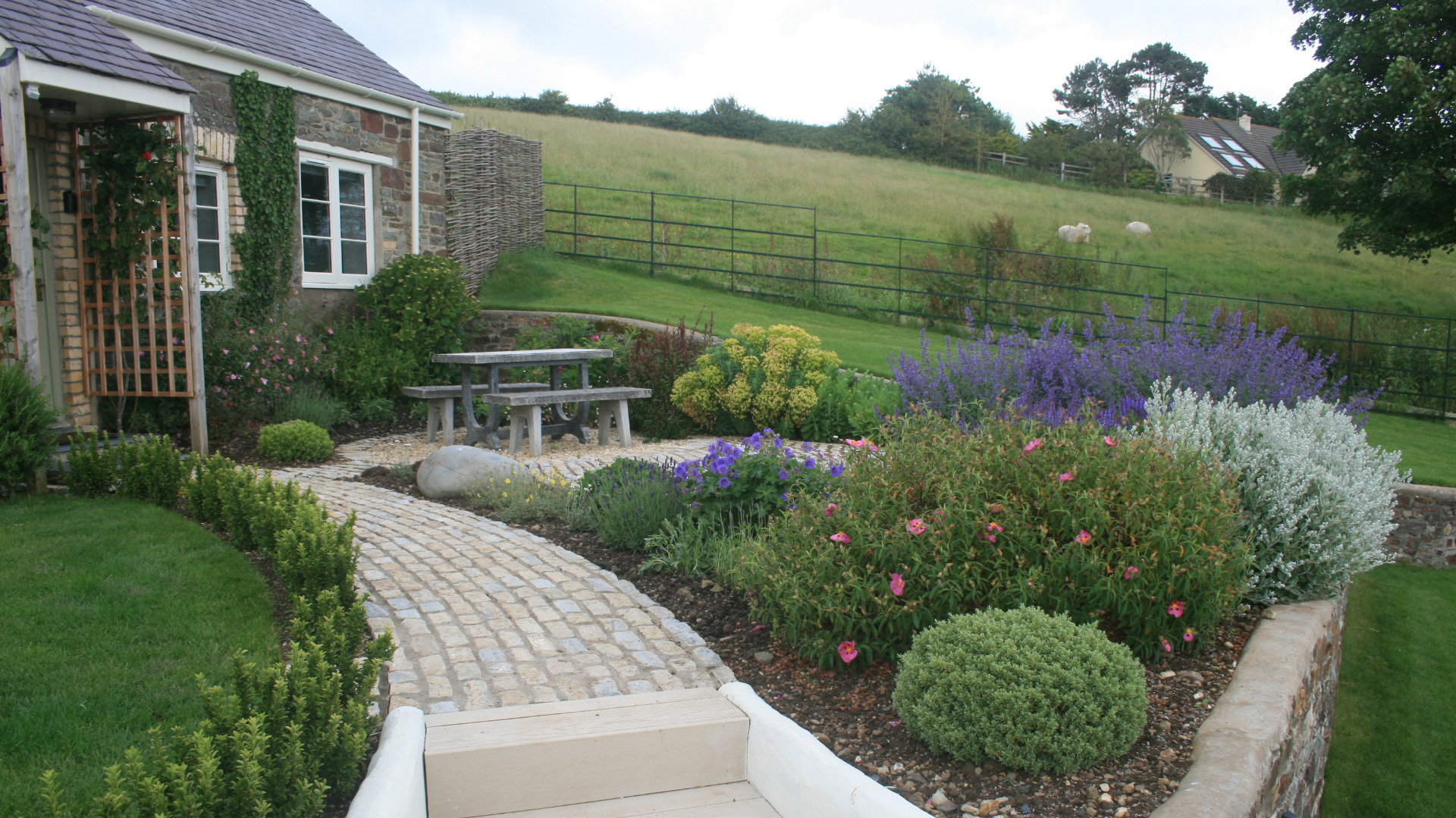 Alison Bockh Garden Design and Landscaping - North Devon - Building the steps to granny annexe complete with cottage garden