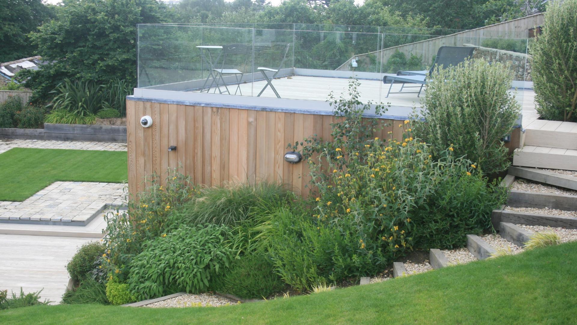 Alison Bockh Garden Design and Landscaping - North Devon - Modern deck over gymnasium overlooking lawned area